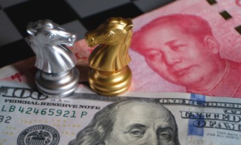Китайский юань укрепился к доллару США до 7,1769 юаня